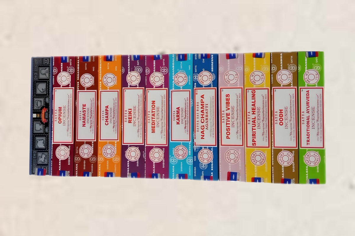 A spread of Satya incense packs in different fragrances